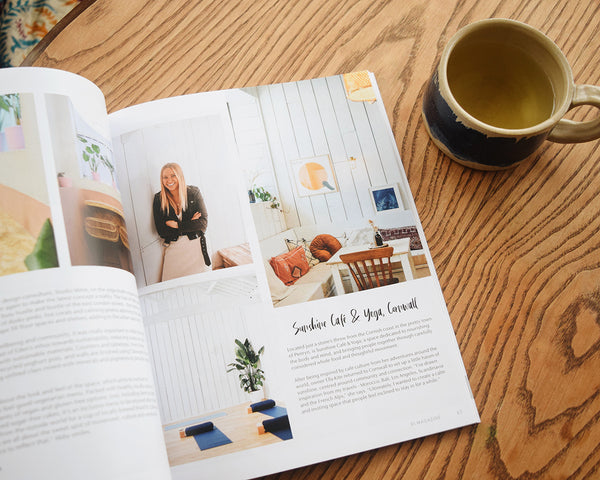 91 Magazine Issue 13 is an independent interiors and lifestyle magazine. Magazine on table with cup of herbal tea.